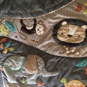 Unisex nursery bedding and diaper holder